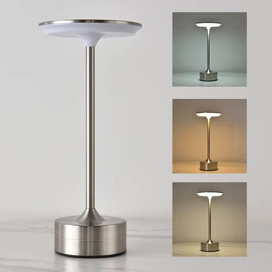 UrbanBaazar electric tabletop lamp with a modern design, featuring a sleek base and a cylindrical lampshade.