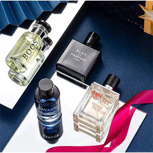 UrbanBaazar perfume gift set with four elegant bottles, showcasing a variety of fragrances in stylish packaging.