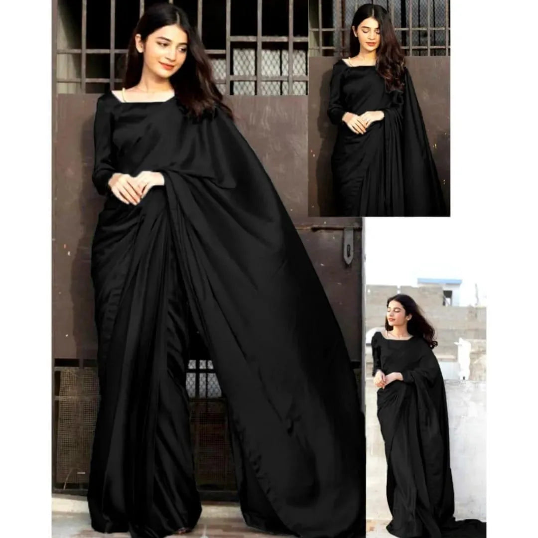Two pieces of UrbanBaazar women's shamoz silk plain stitched sarees in elegant, flowing fabric.
