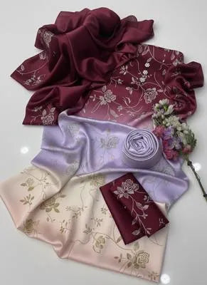 Unstitched silky suit set featuring a digital printed long airline shirt, trousers, and a China silk dupatta for women.