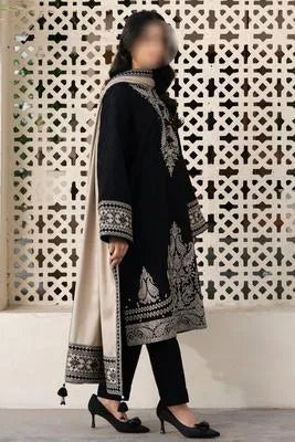 Three pieces of UrbanBaazar women's unstitched embroidered suit with intricate designs and vibrant colors displayed.