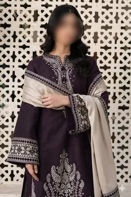 Three pieces of UrbanBaazar unstitched embroidered suit with intricate designs in vibrant colors.